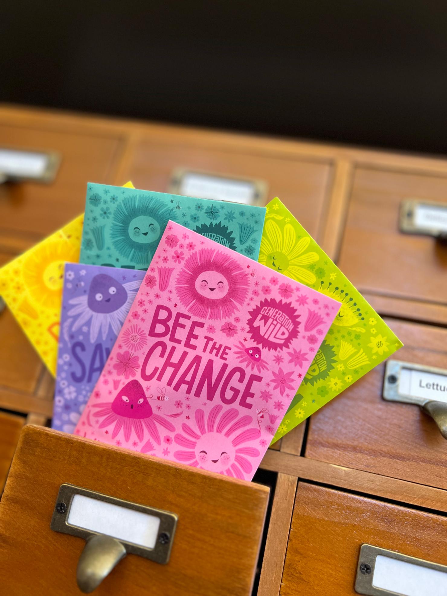 Wildflower seed packets in a drawer.