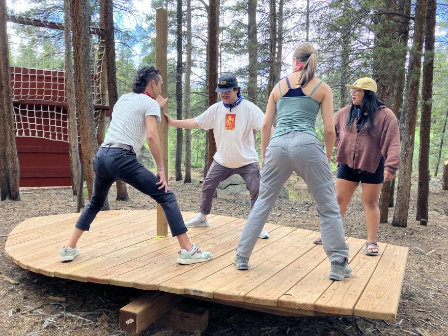 David and The Nature Conservancy Fellows on the COBS low ropes course. Photo courtesy of Colorado Outward Bound School (COBS).