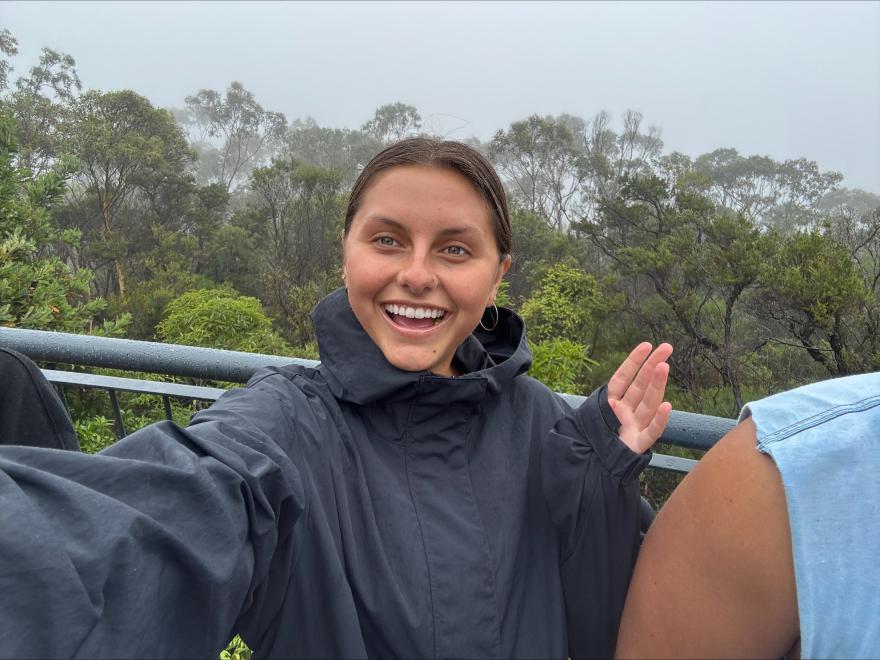 Sofia Blanco posing for a selfie, wearing a rain jacket.