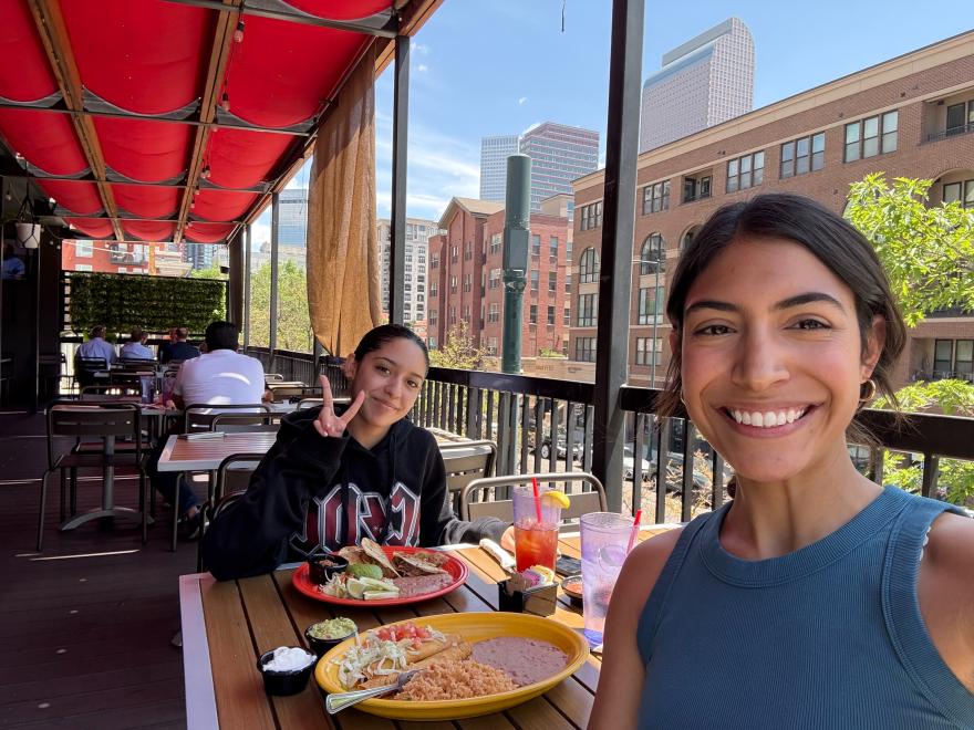 Danni and her supervisor out for lunch, posing for a photo