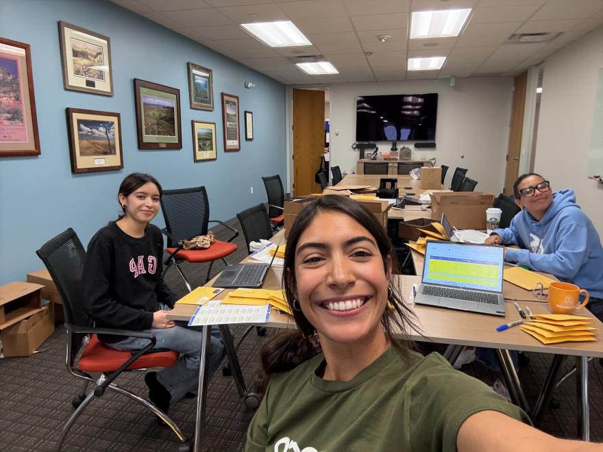 Daniela and GOCO team makes working together in a conference room.