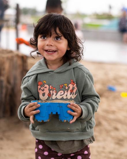 Child playing in a sandbox at Panorama Park, Colorado Springs.